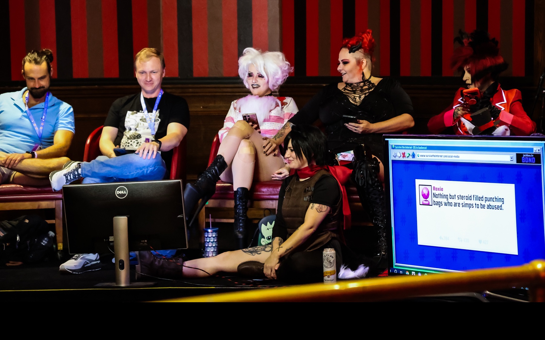 Panelists hosting a programming event at Queen City Anime Con