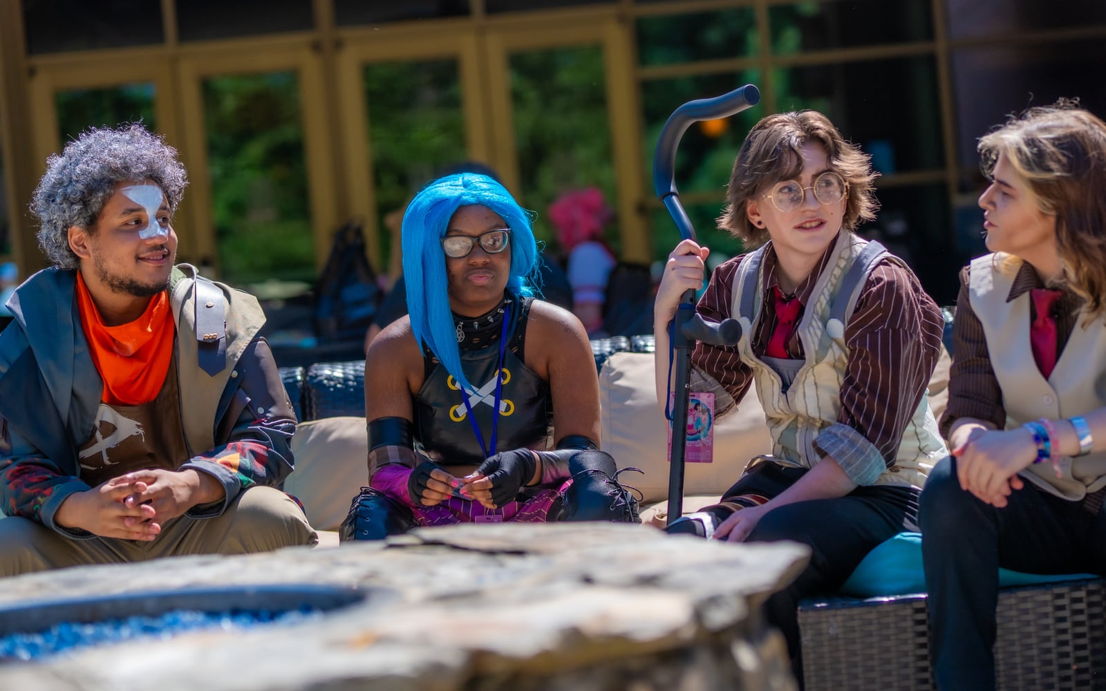 Cosplayers relaxing together at Queen City Anime Con